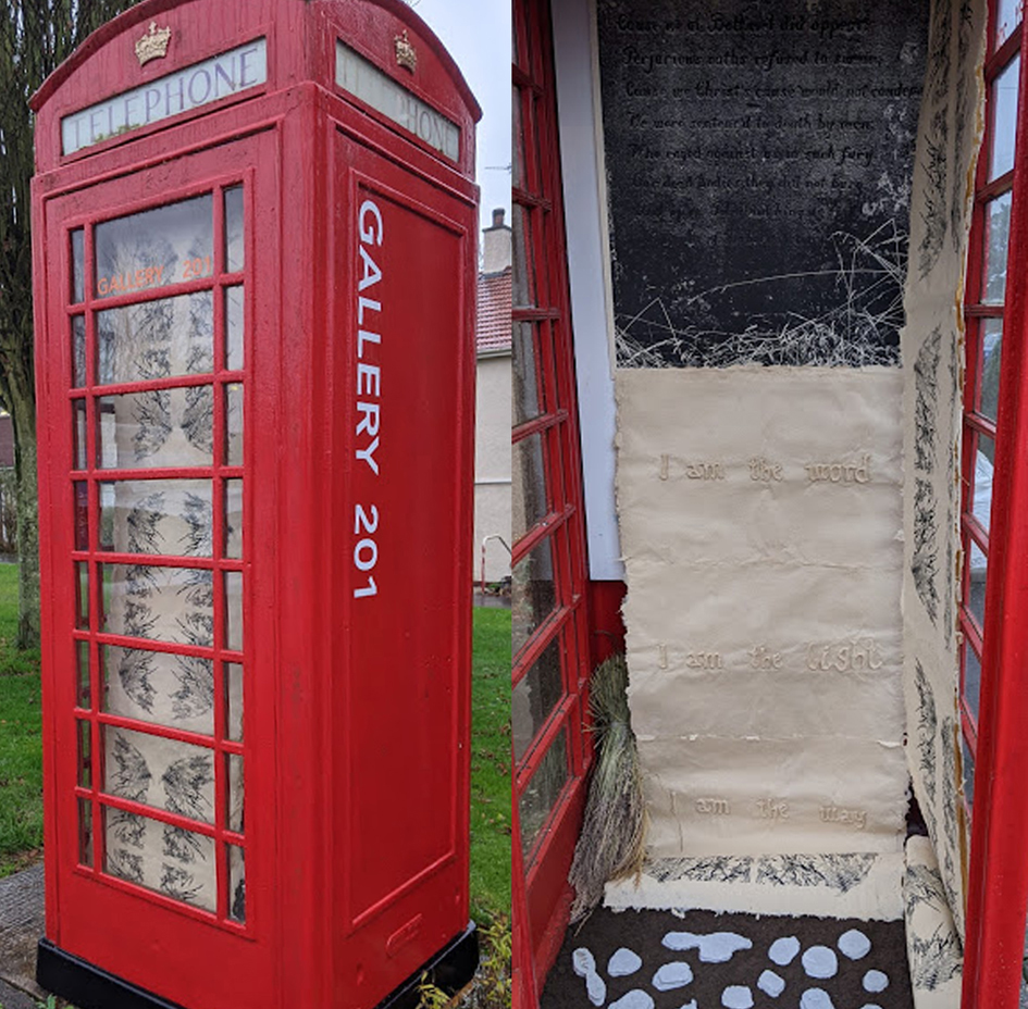 An exhibition in a red telephone box