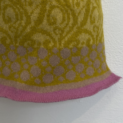 edge of coloured wool woven scarf